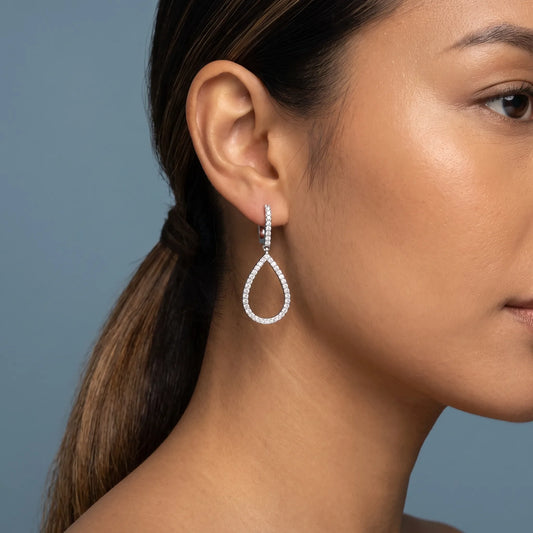 14KT White Gold Diamond Teardrop Pave Earrings - worn close up