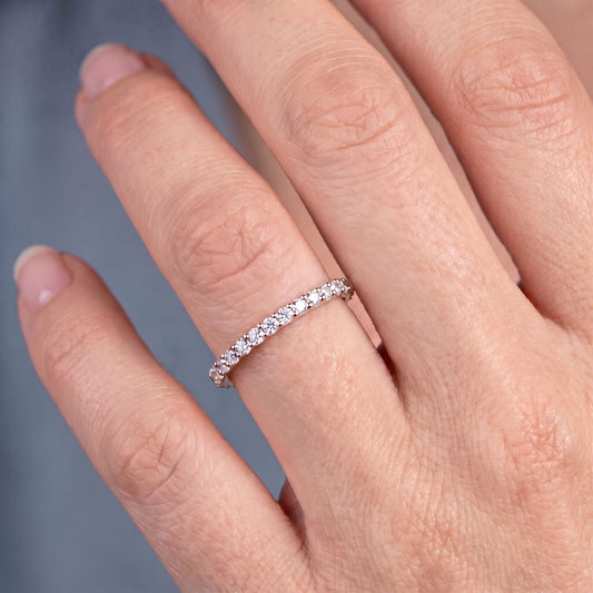 14K Rose Gold Round Cut Diamond 4 Prong Eternity Band 1.6mm - worn on hand