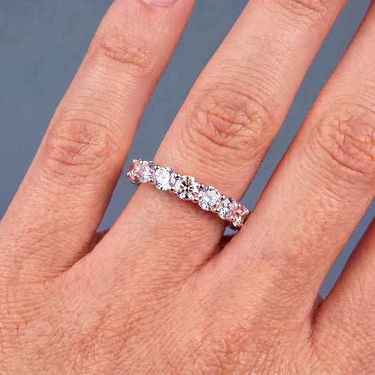 10K Rose Gold Round Cut Diamond Unity Prong Eternity Band 2.5mm - worn on hand