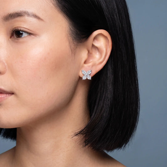 10KT Rose Gold Diamond Butterfly Earrings - worn close up
