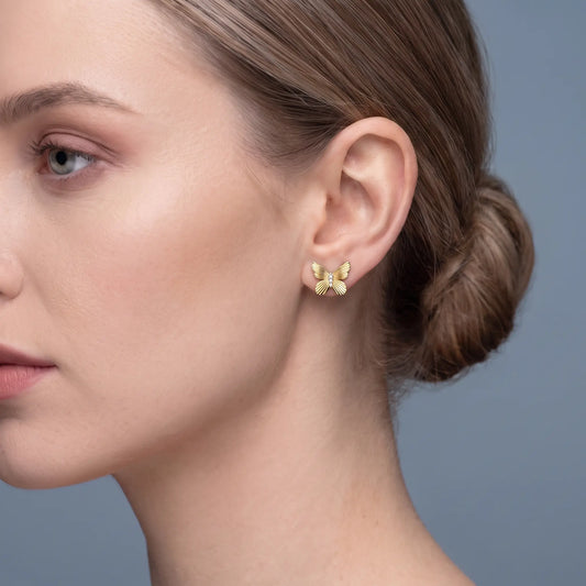 10KT Yellow Gold Round Diamond Butterfly Cluster Earrings - worn close up