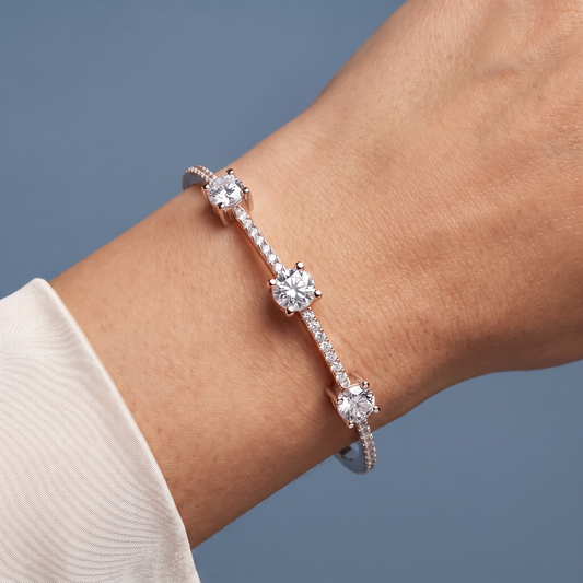 10K Rose Gold Three Stone Round Cut Diamond Bangle Bracelet - Close-up