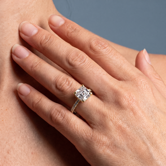 18 KT Yellow Gold Asscher Cut Diamond Solitaire Ring - worn close-up