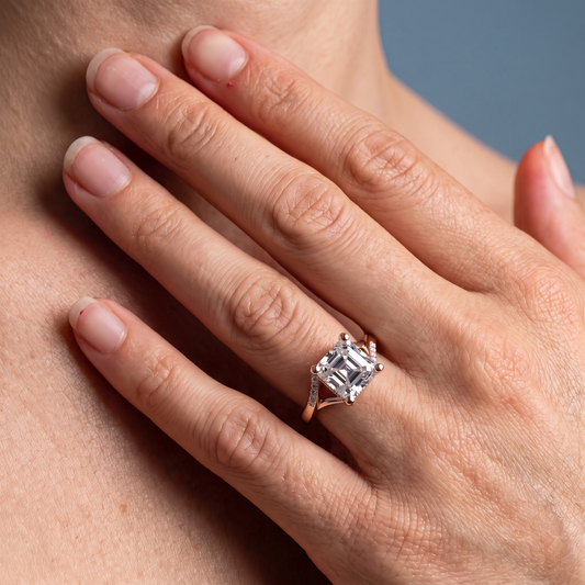 14 KT Rose Gold Asscher Cut Diamond Split Shank Engagement Ring with Hidden Halo - worn close-up