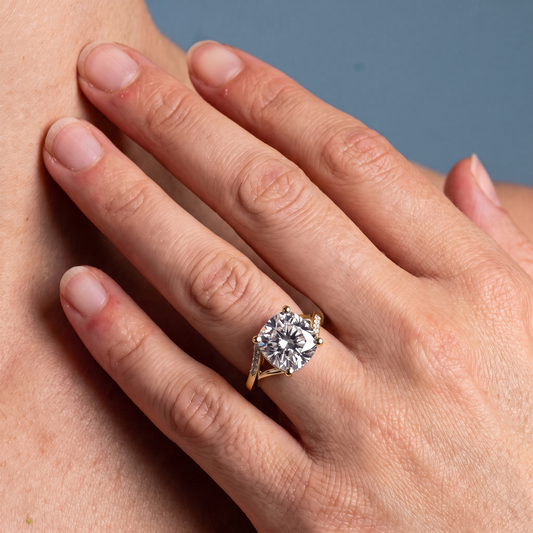 14 KT Yellow Gold Cushion Cut Diamond Split Shank Engagement Ring with Hidden Halo - worn close-up