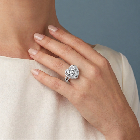 18 KT White Gold Heart Cut Diamond Halo Ring with Twin Pave Band - worn close-up