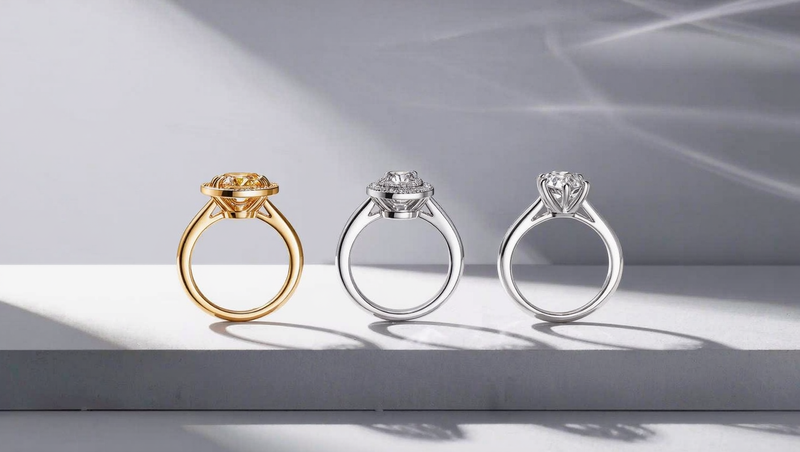 Bezel, hidden halo and east-west engagement ring settings