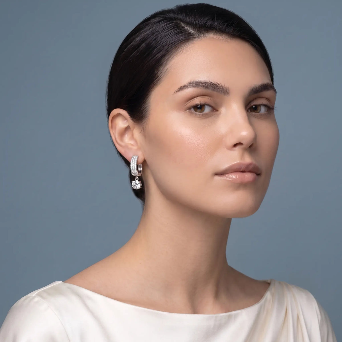 Platinum Round Diamond Pave Hoop Earrings with Charm Drop - model beauty shot