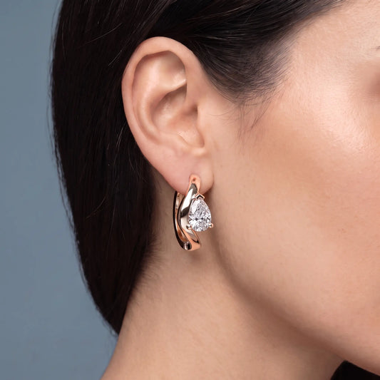 10KT Rose Gold Pear Diamond Three-Stone Hoop Earrings - worn close up