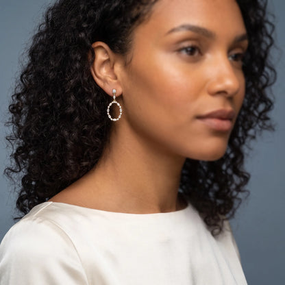 14KT Yellow Gold Diamond Oval Hoop Drop Earrings - model beauty shot