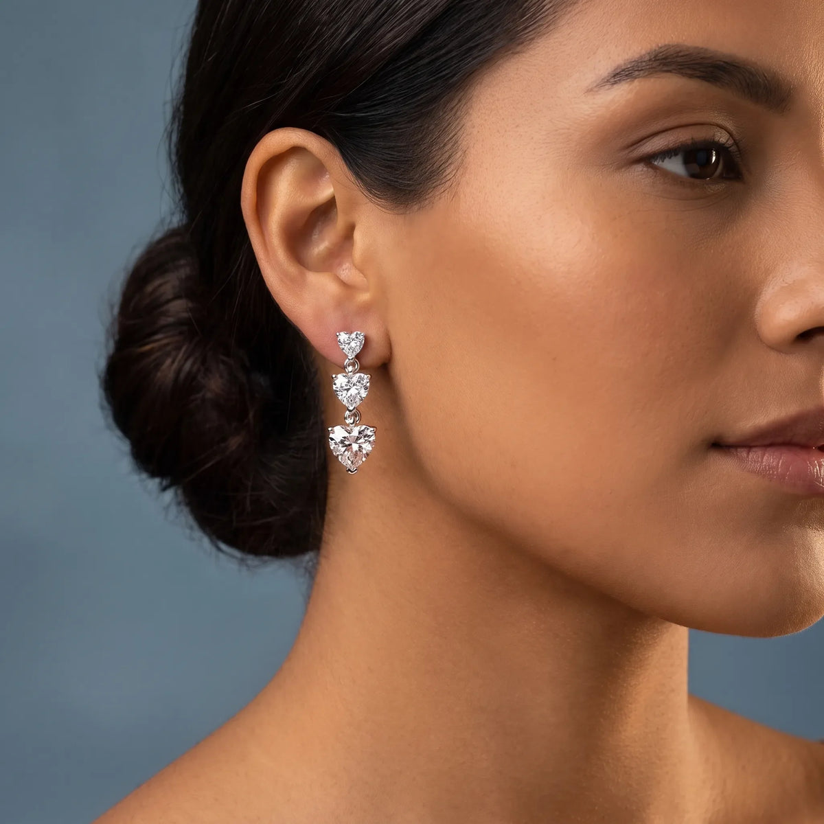 Silver Diamond Three Heart Drop Earrings - worn close up