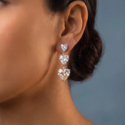 10KT Yellow Gold Diamond Three Heart Drop Earrings - worn close up