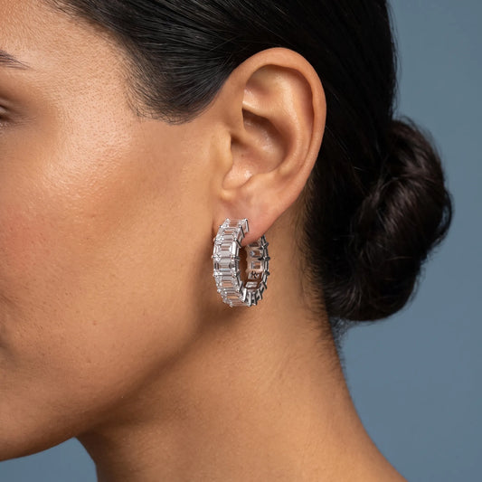 Platinum Diamond Emerald Hoop Earrings - worn close up