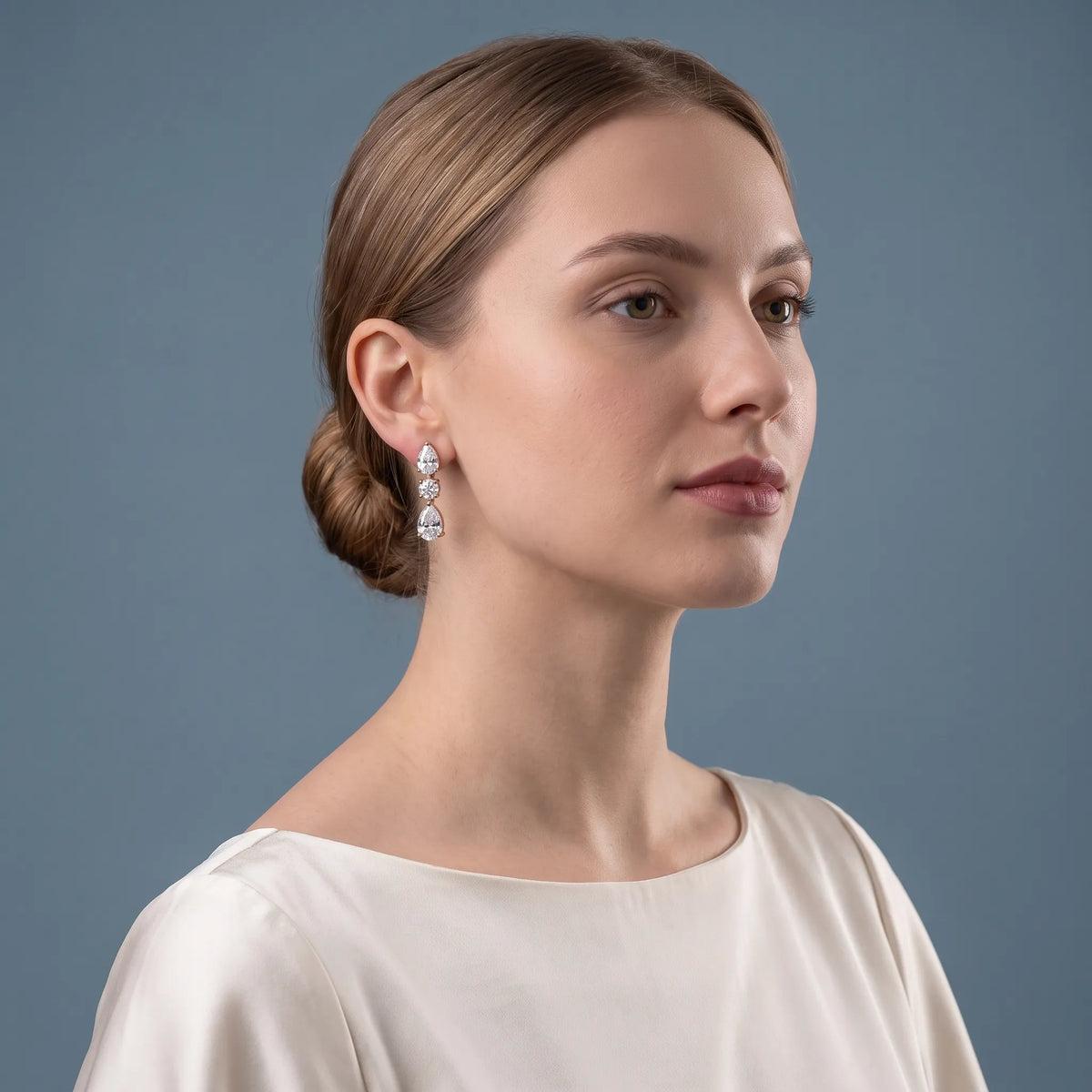 10KT Rose Gold Diamond Pear Round Three Stone Earrings - model beauty shot