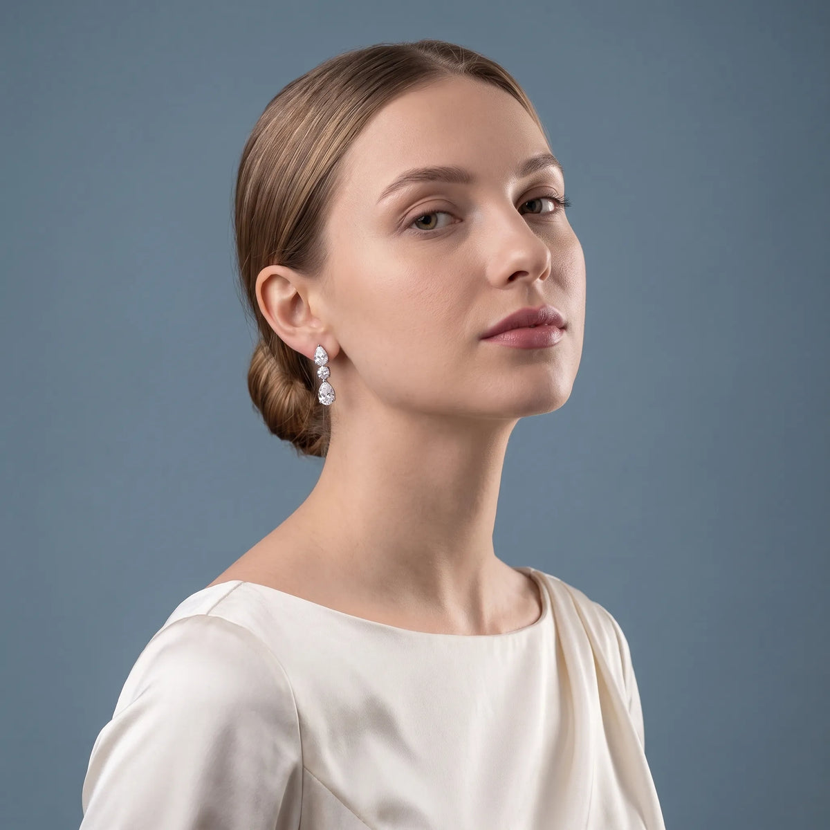Silver Diamond Pear Round Three Stone Earrings - model beauty shot