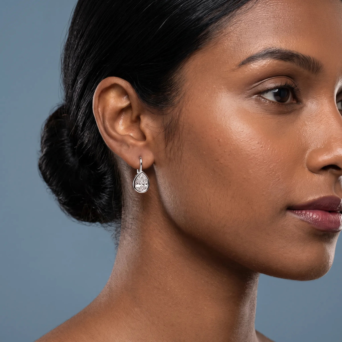 Platinum Diamond Pear Drop Earrings - worn close up