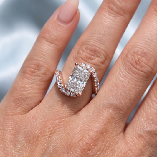 Rose Gold Radiant Cut Diamond Solitaire Ring with Pave Wave Band - On finger
