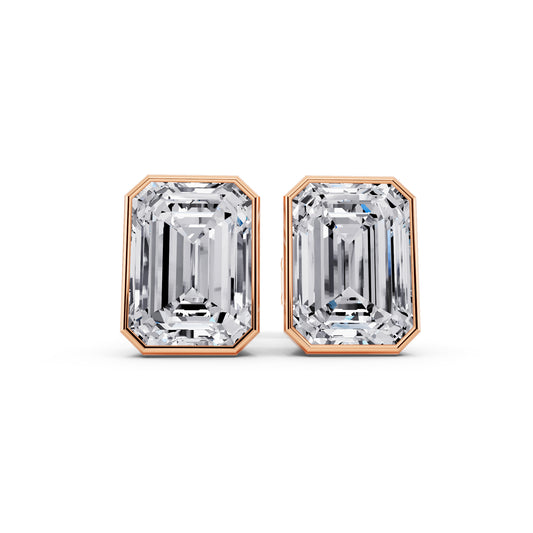 Bezel emerald cut diamond stud earrings rose gold front view