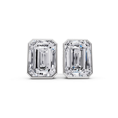 Bezel emerald cut diamond stud earrings front view