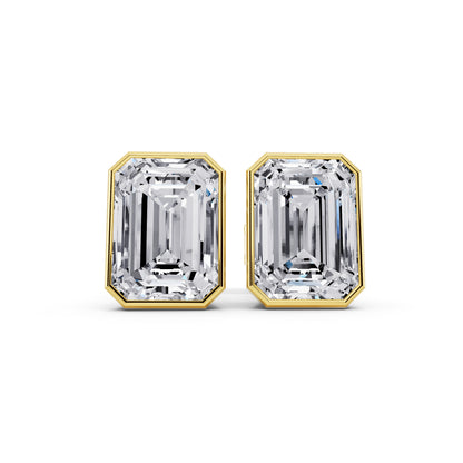 Bezel emerald cut diamond stud earrings yellow gold front view