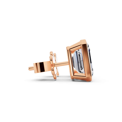 Bezel emerald cut diamond stud earrings rose gold side view