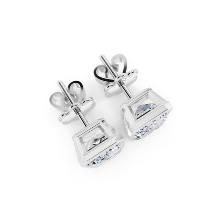 Bezel emerald cut diamond stud earrings top view