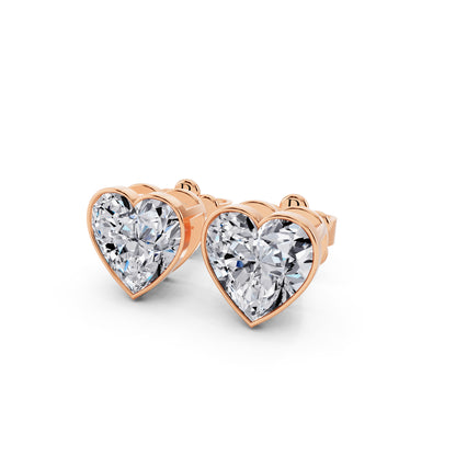 Bezel heart cut diamond stud earrings rose gold close up view