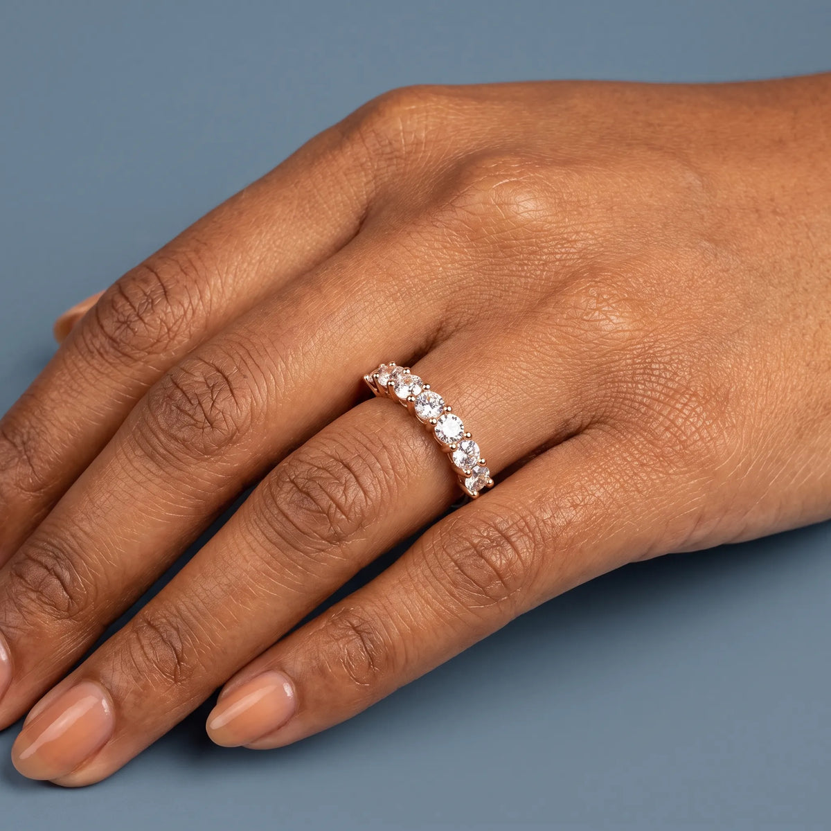 14K Rose Gold Seven Stone Round Cut Diamond Half Eternity Wedding Band - worn on hand
