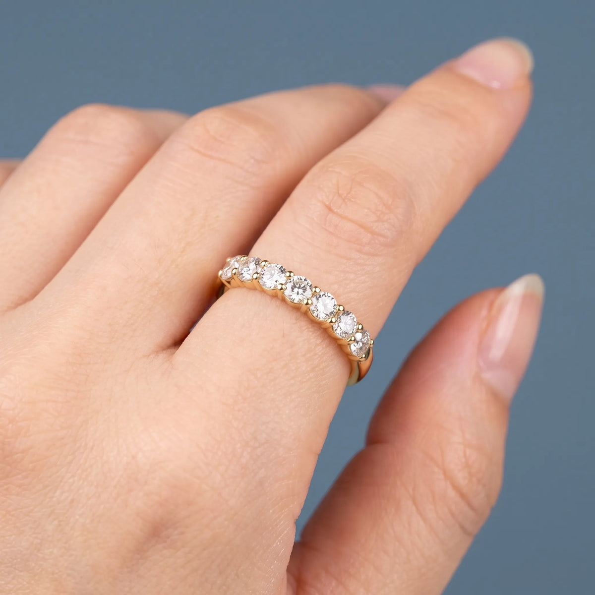 10K Yellow Gold Seven Stone Round Cut Diamond Half Eternity Wedding Band - worn on hand