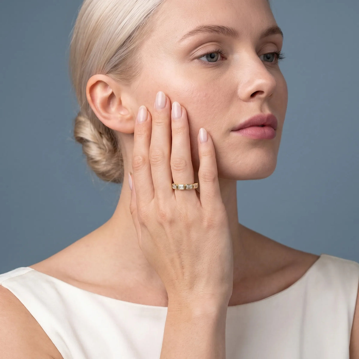 10K Yellow Gold Seven Stone Emerald Cut Bezel Set Diamond Half Eternity Wedding Band - model beauty shot