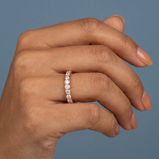 10K Rose Gold Round Cut Bezel Set Diamond Full Eternity Wedding Band 2.4mm - worn on hand