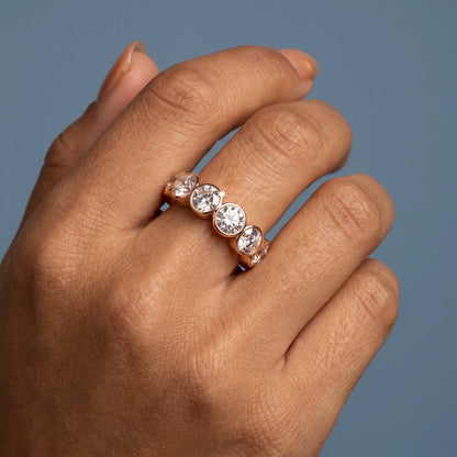 14K Rose Gold Round Cut Bezel Set Diamond Full Eternity Wedding Band 4.1mm - worn on hand