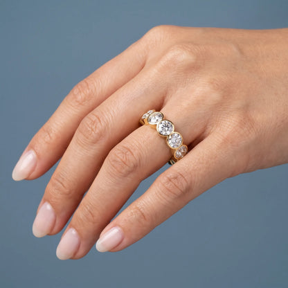 14K Yellow Gold Round Cut Bezel Set Diamond Full Eternity Wedding Band 5.9mm - worn on hand