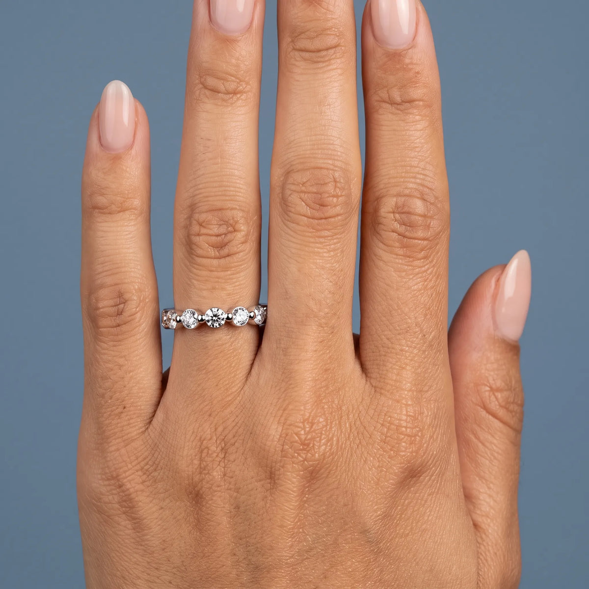 14K White Gold Round Cut Diamond Half Sculpted Prong Eternity Band 2.3mm - worn on hand