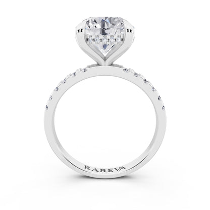18 KT White Gold Round Cut Diamond Solitaire Ring with Round Pavé Band and Prong Setting - through finger