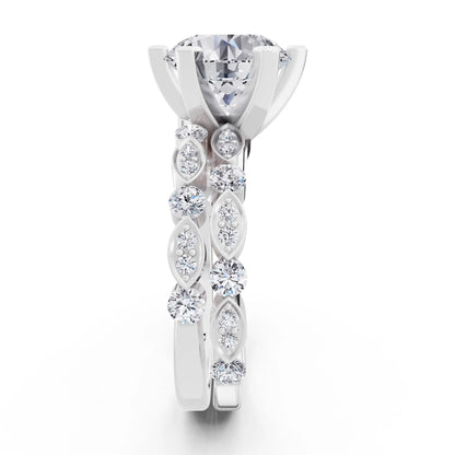 Platinum Round Cut Diamond Solitaire Ring with Marquise Motif Band - Side view