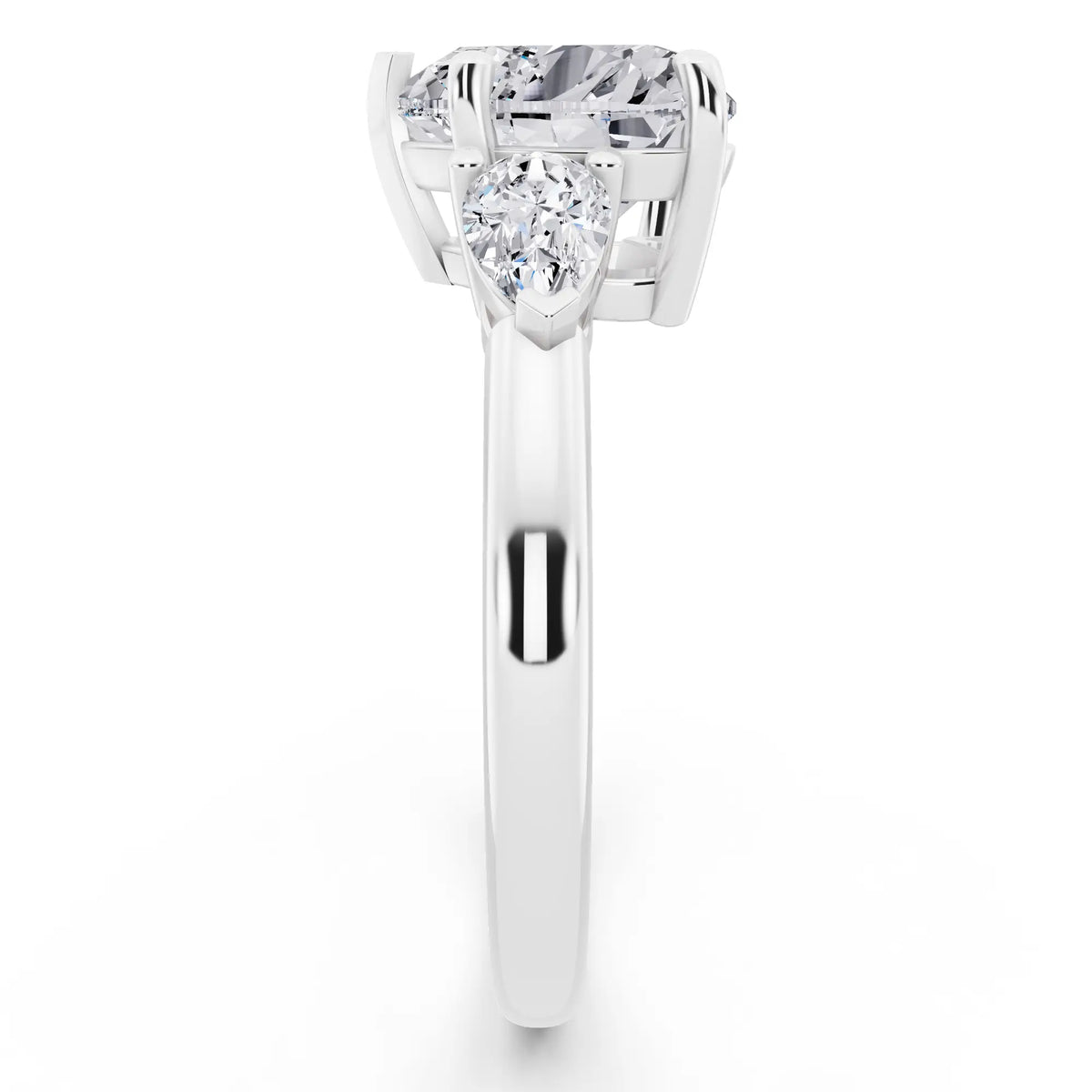 Platinum Heart Cut Diamond Three Stone Pear Accent Ring - side view