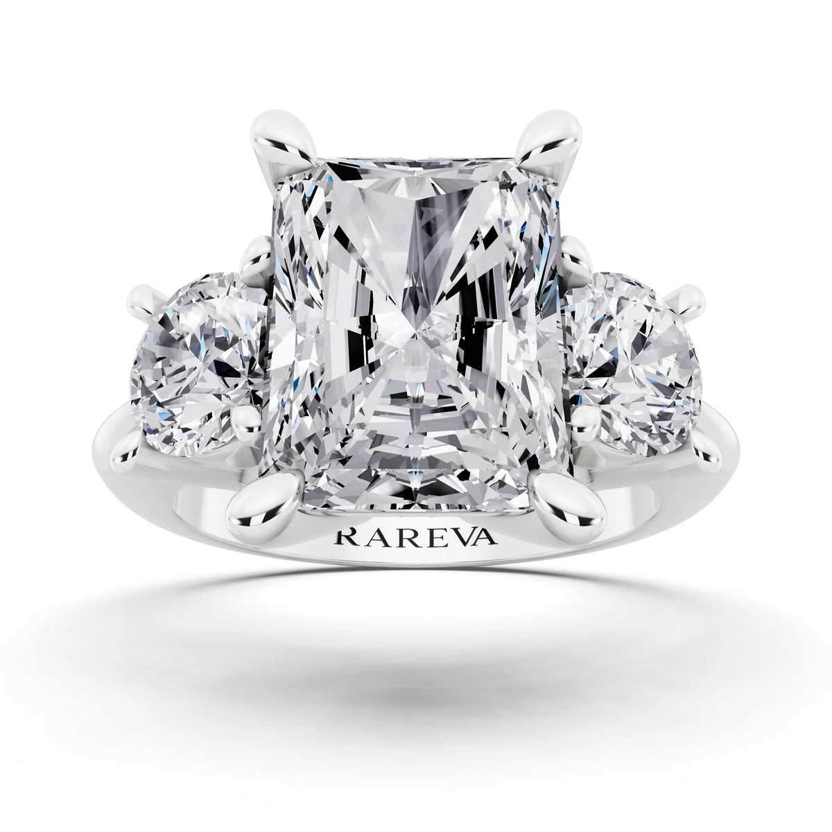 Platinum Radiant Cut Diamond Three Stone Ring with Round Accents - front view