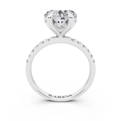 14 KT White Gold Heart Cut Diamond Solitaire Ring with Round Pavé Band and Prong Setting - through finger