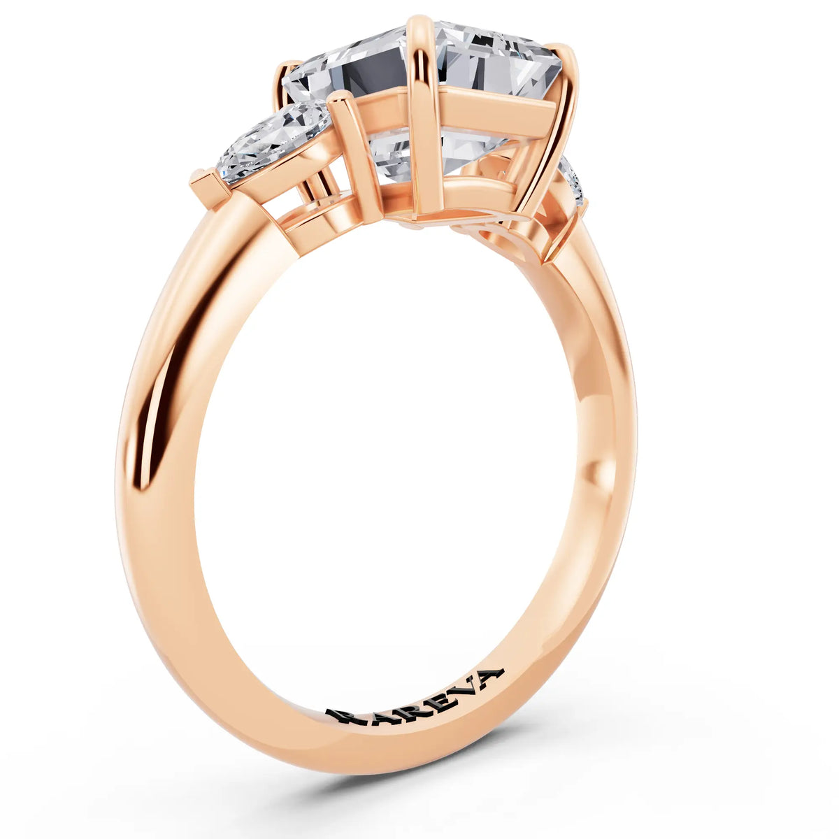 14 KT Rose Gold Emerald Cut Diamond Three Stone Pear Accent Ring - top view