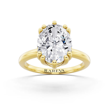 18 KT Yellow Gold Oval Cut Diamond Solitaire Ring with Hidden Accent Basket - front view