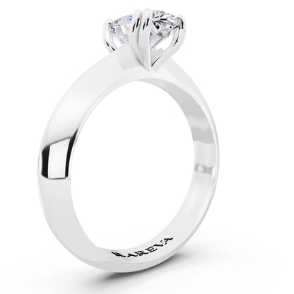 18 KT White Gold Pear Cut Diamond Solitaire Ring with Knife Edge Band - top view