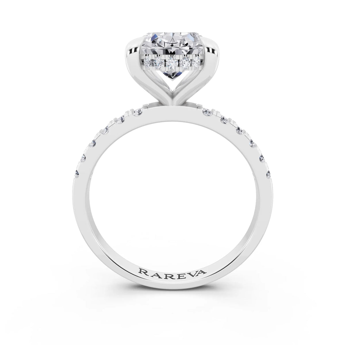 18 KT White Gold Oval Cut Diamond Solitaire Ring with Round Pavé Band and Prong Setting - through finger
