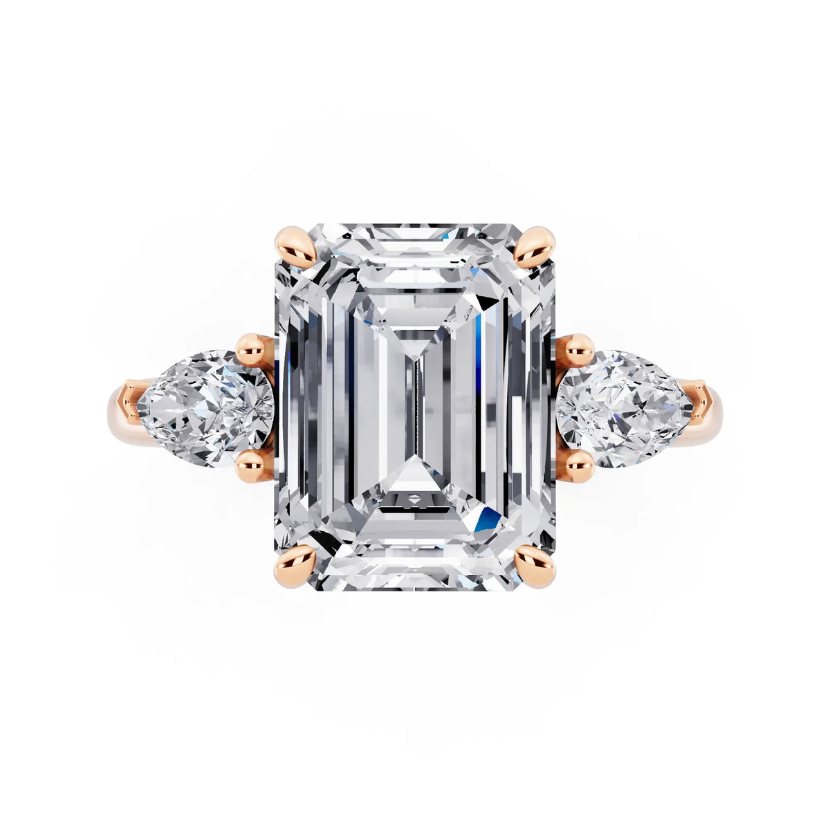 14 KT Rose Gold Emerald Cut Diamond Three Stone Pear Accent Ring - top angle