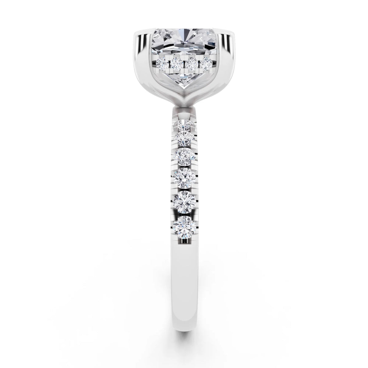 Platinum Cushion Cut Diamond Solitaire Ring with Round Pavé Band and Prong Setting - side view