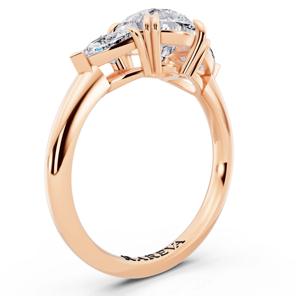 18 KT Rose Gold Pear Cut Diamond Three Stone Ring with Trillion Accents - top view