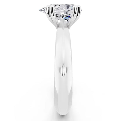 18 KT White Gold Pear Cut Diamond Solitaire Ring with Knife Edge Band - side view