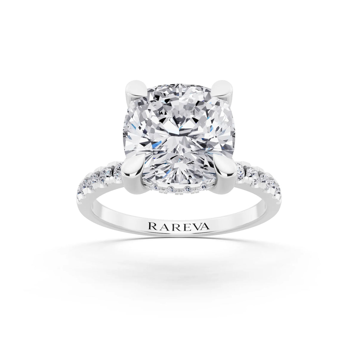 Platinum Cushion Cut Diamond Solitaire Ring with Round Pavé Band and Prong Setting - front view