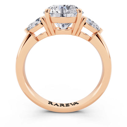 14 KT Rose Gold Round Cut Diamond Three Stone Pear Accent Ring - through finger