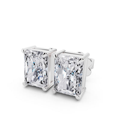 Radiant cut tiger-prong diamond stud earrings in silver, close-up